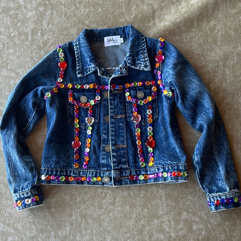 Trendy girls denim jacket adorned with decorative gems!